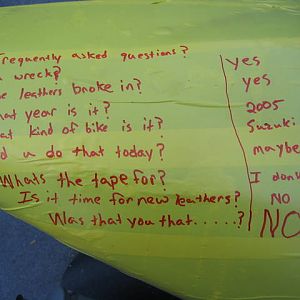 Funny sign, taped on the back of a really beaten up bike