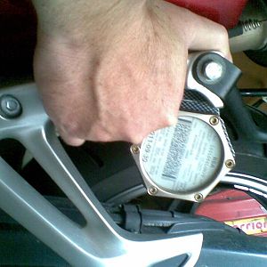 Rear grip for lifting on centre stand
