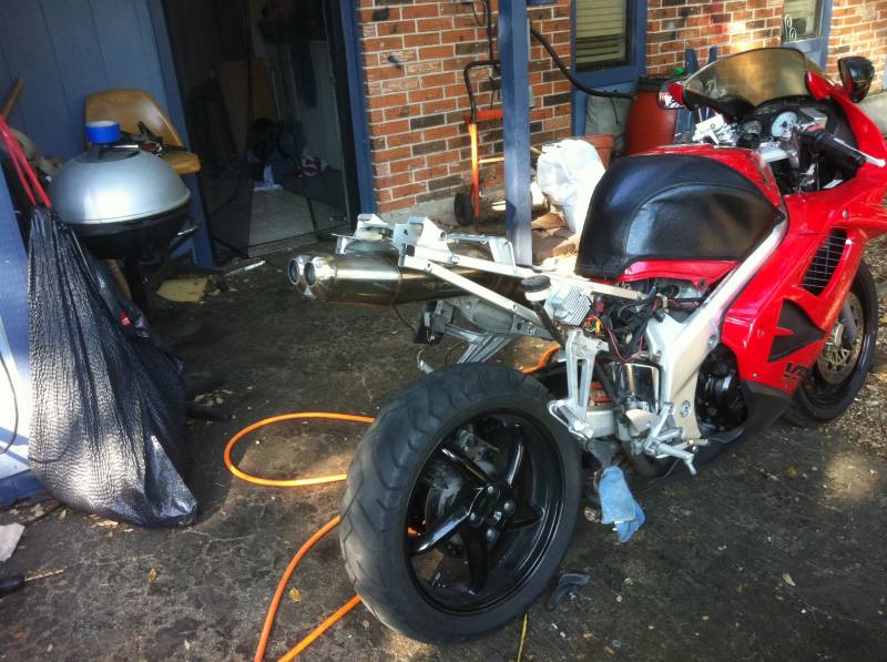 97 vfr with a 2005 cbr1000rr rear exhaust custom seat